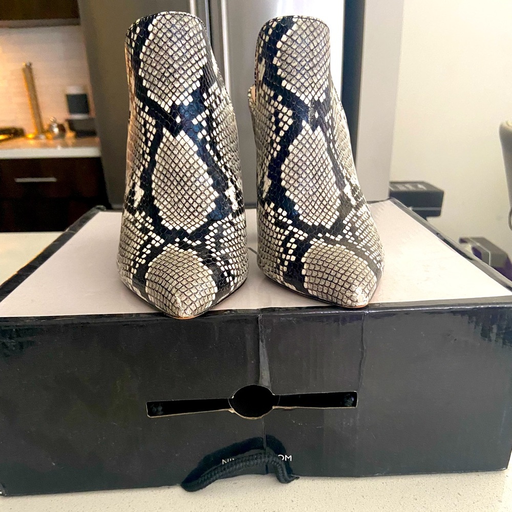 Aldo size 7 snake skin slip on Mules 3.75 heel.